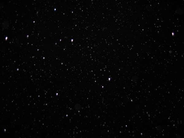 Flash on raindrops at night