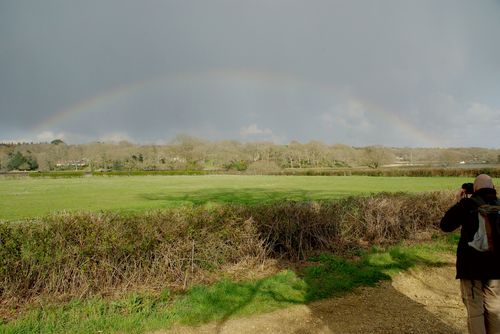 Michel photographs a rainbow